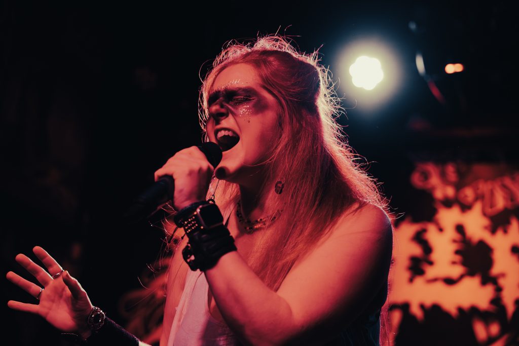 Emilie Bienne, vocalist of NYC symphonic power metal band BLOODFATE, performing live